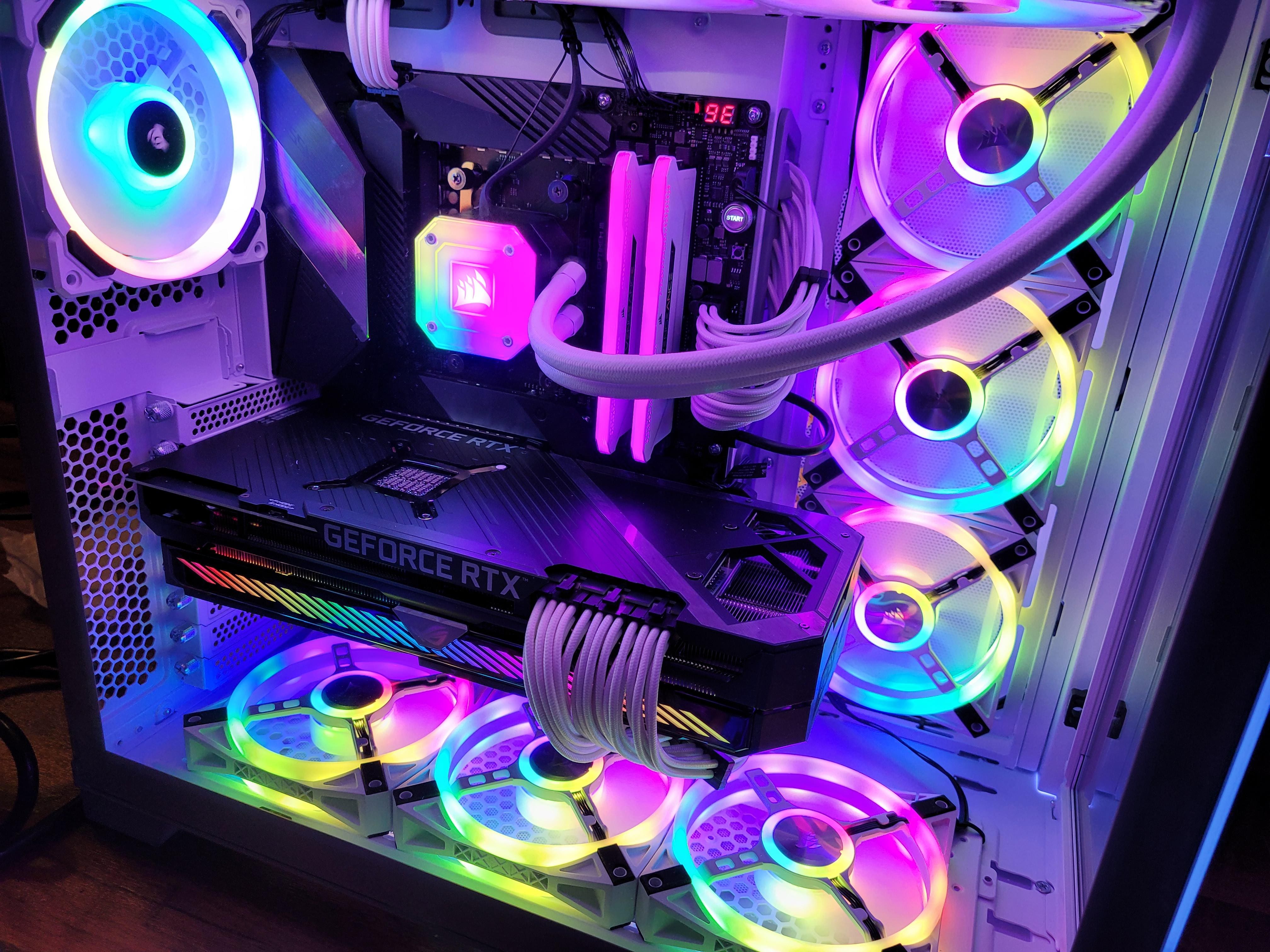 Close up of a high-end PC interior, lit up with a green RGB lighting scheme.